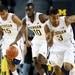 Michigan junior Tim Hardaway Jr. races forward with other teammates in the first half of the game against Binghamton on Tuesday. Daniel Brenner I AnnArbor.com